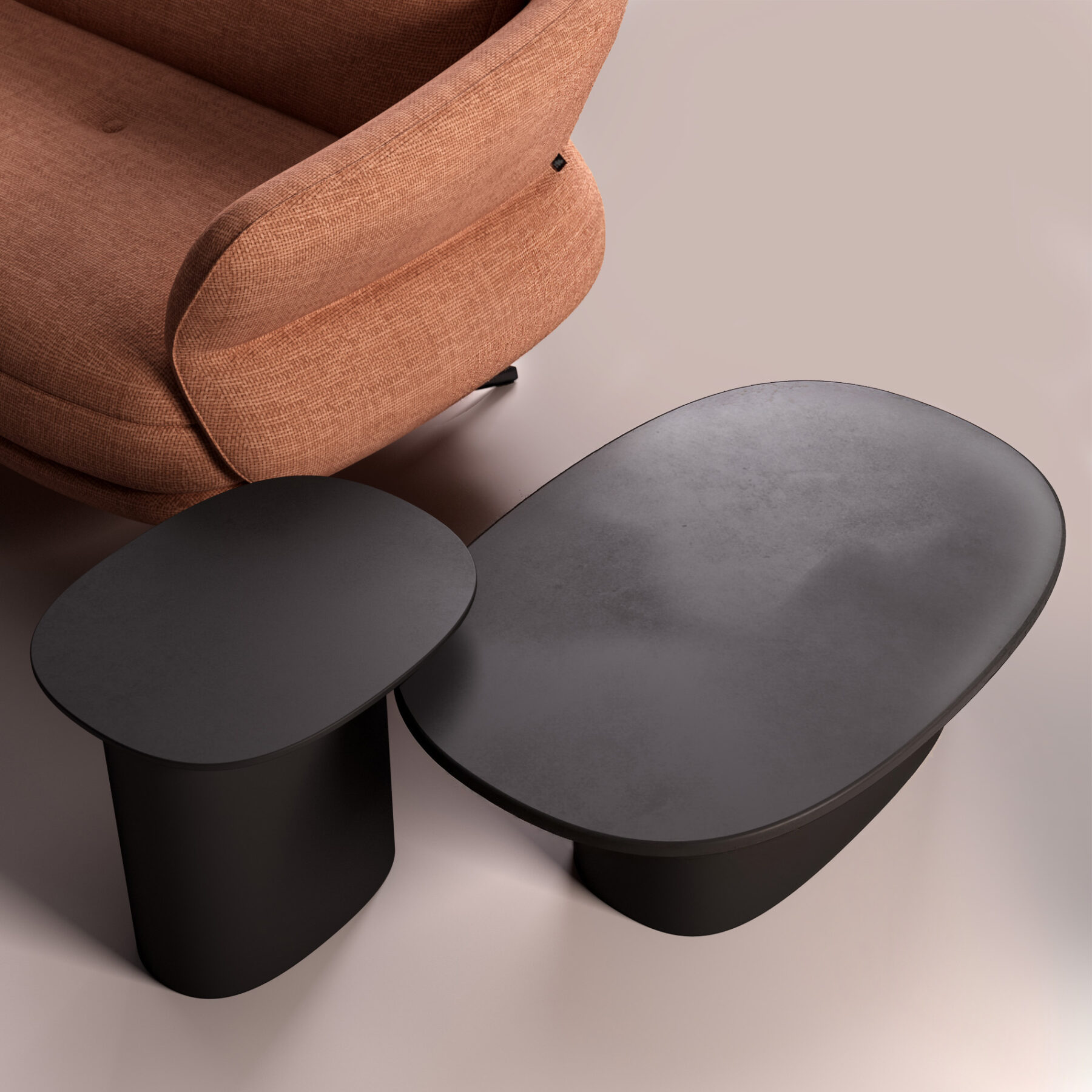 TULIP sofa in terracotta fabric, petal-shaped silhouette design by Joly Design for Vilmers (2023), featuring soft curves and slender black metal legs.