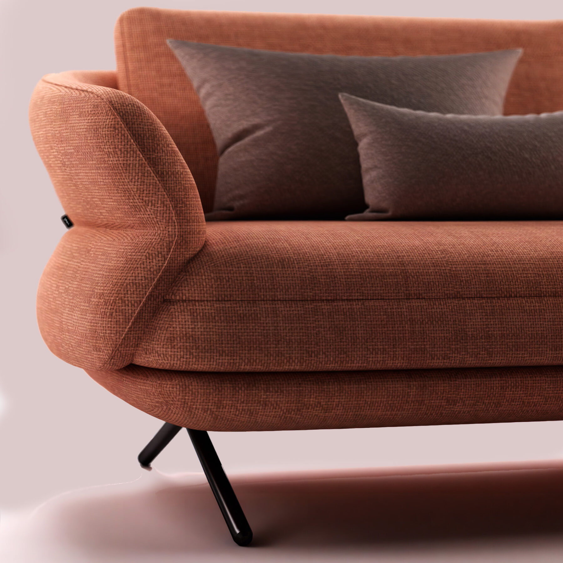 Canapé TULIP en tissu terracotta, silhouette en forme de pétale dessinée par Joly Design pour Vilmers (2023), aux courbes douces et pieds fins en métal noir.