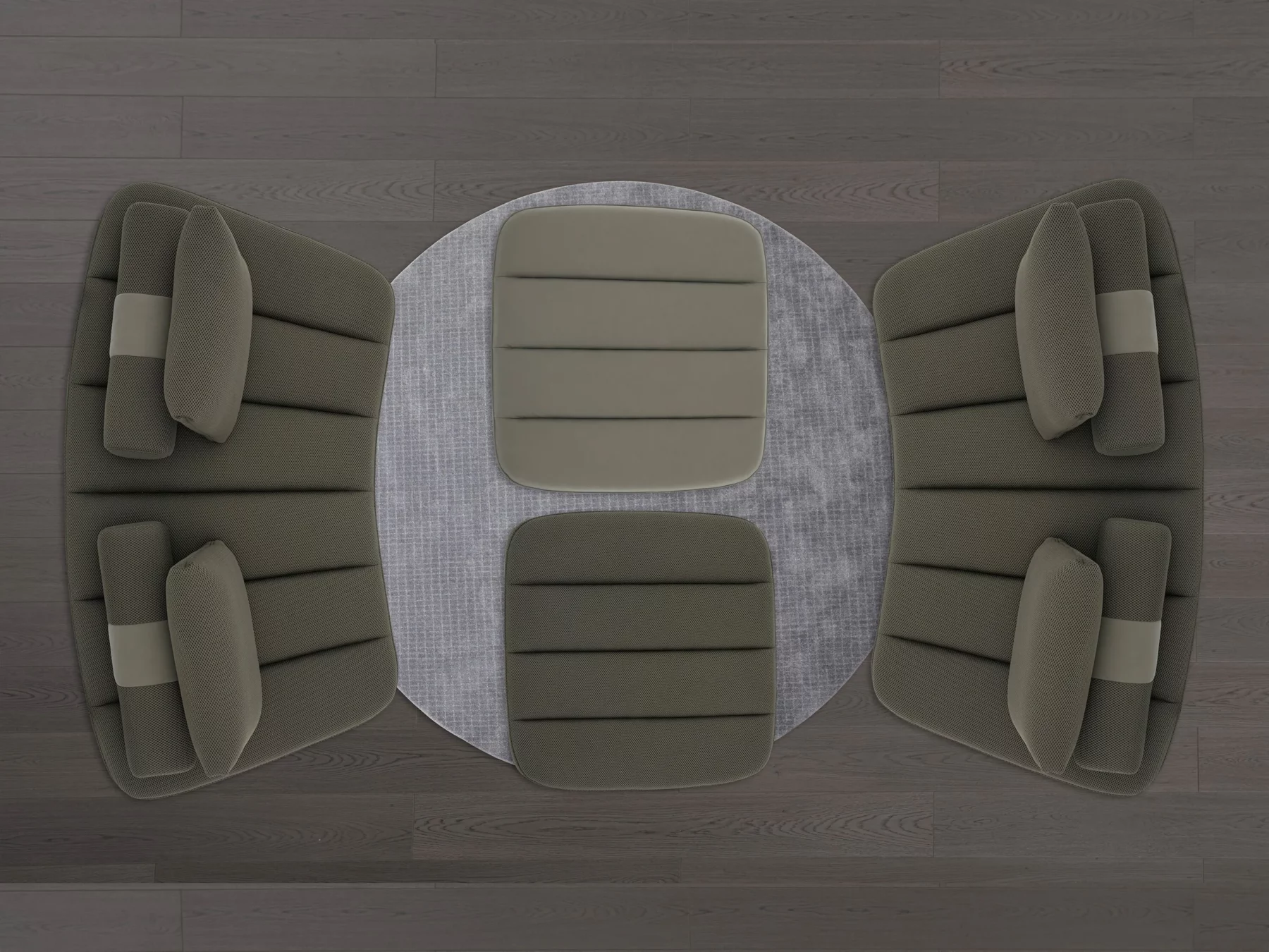 Contemporary modular sofa in anthracite, featuring three curved sections with quilted seats and several matching rectangular cushions.