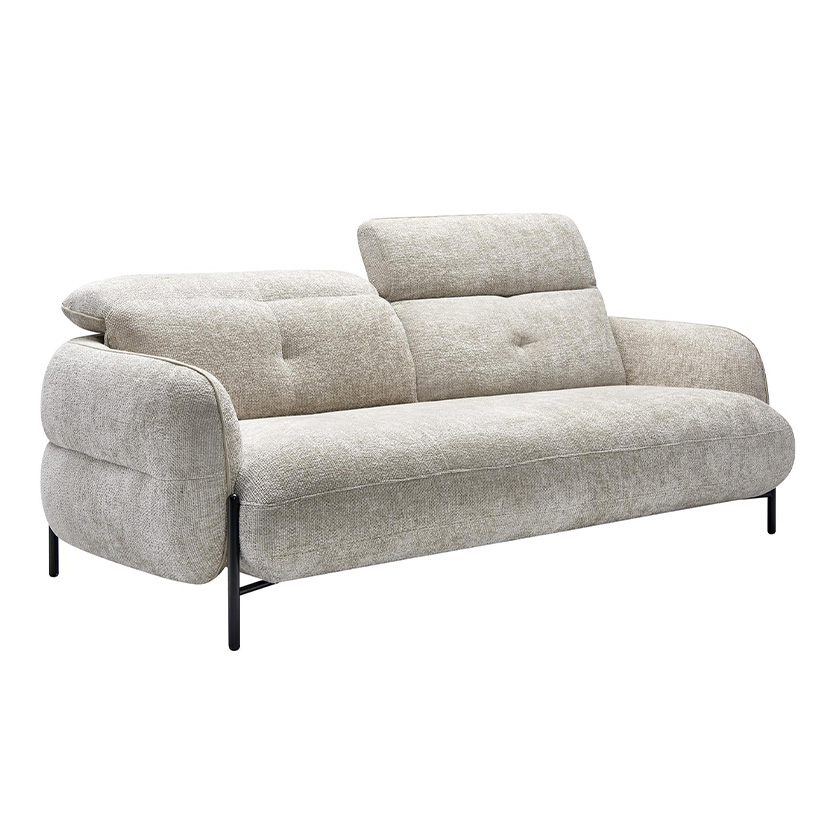 Compact sofa in beige textured fabric, rounded silhouette, adjustable headrests, and black metal legs.
