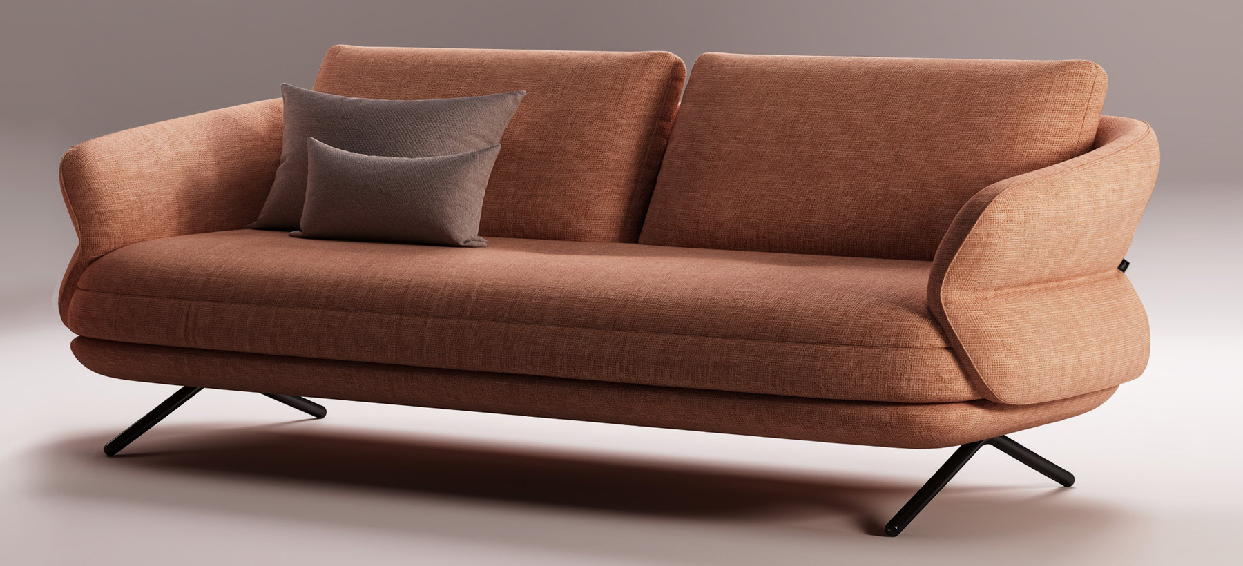 Canapé TULIP en tissu terracotta, silhouette en forme de pétale dessinée par Joly Design pour Vilmers (2023), aux courbes douces et pieds fins en métal noir.